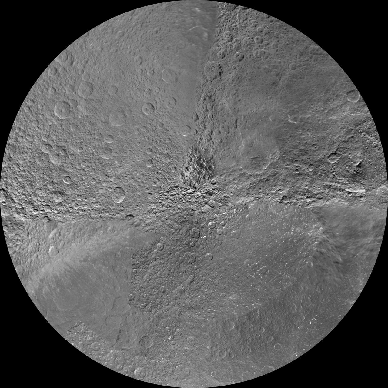 The northern and southern hemispheres of Rhea are seen in these polar stereographic maps, mosaicked from the best-available NASA Cassini and Voyager images. Six Voyager images fill in gaps in Cassini coverage of the moon north pole.