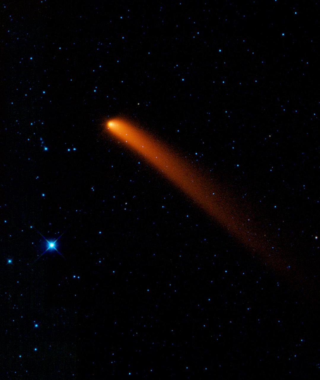 Comet Siding Spring appears to streak across the sky like a superhero in this new infrared image from NASA Wide-field Infrared Survey Explorer. The comet, also known as C/2007 Q3, was discovered in 2007 by observers in Australia.