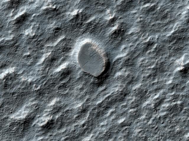 NASA image: Craters on an Ice-Rich Débris Apron