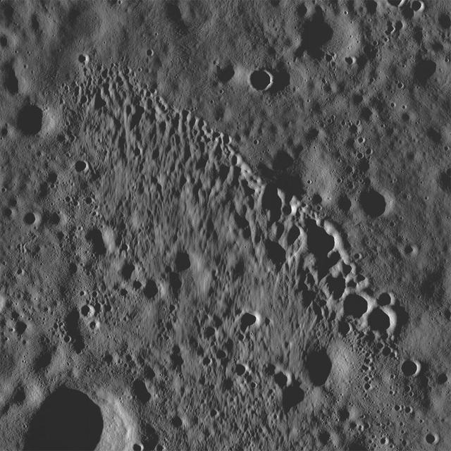 NASA Lunar Reconnaissance Orbiter showing a string of secondary craters from an impact crater to the north, probably Giordano Bruno.