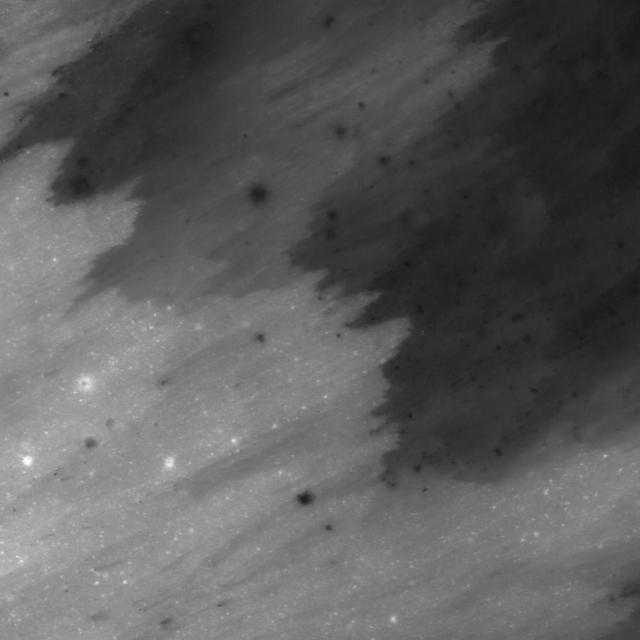 This image acquired by NASA Lunar Reconnaissance Orbiter shows a crater center of image formed by impact of the Apollo 14 Saturn IVB booster.