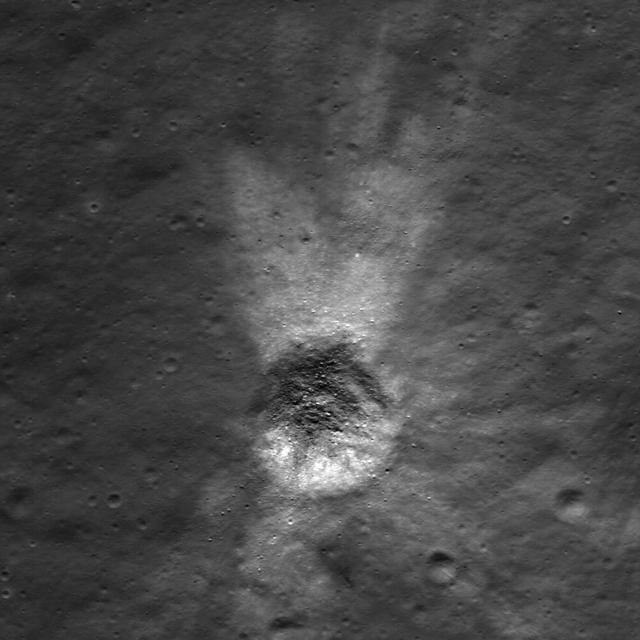 Distinctive asymmetrical ejecta surrounding a 140 meter diameter crater in the lunar highlands as seen by NASA Lunar Reconnaissance Orbiter. Crater is located on the northeastern rim of the eroded pre-Nectarian crater Hommel.