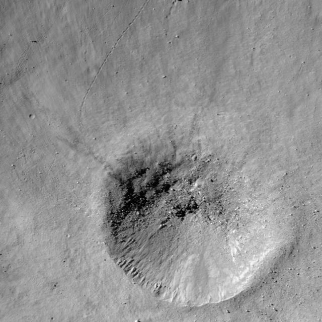 NASA Lunar Reconnaissance Orbiter takes a look at a fresh crater on the southwest rim of Metius B crater.