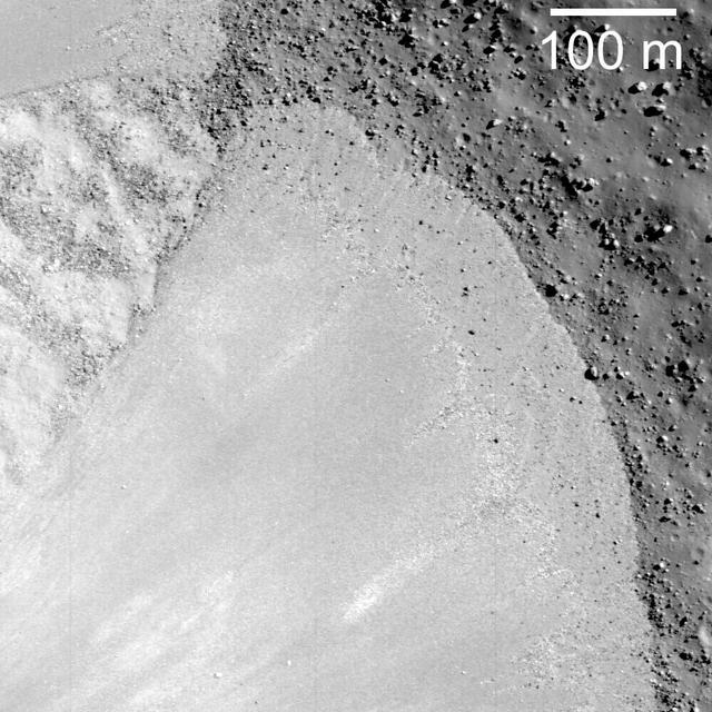 NASA Lunar Reconnaissance Orbiter captures a debris flow extending down the southwest wall of Janssen K crater.