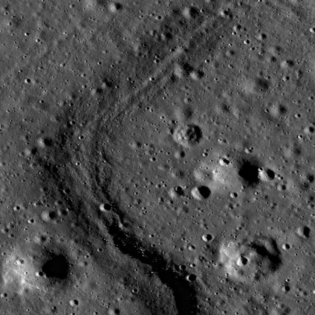 This high resolution image taken by NASA Lunar Reconnaissance Orbiter shows the floor of the Apollo Basin, a large 538 km diameter double-ringed impact crater in the southern hemisphere of the far side.