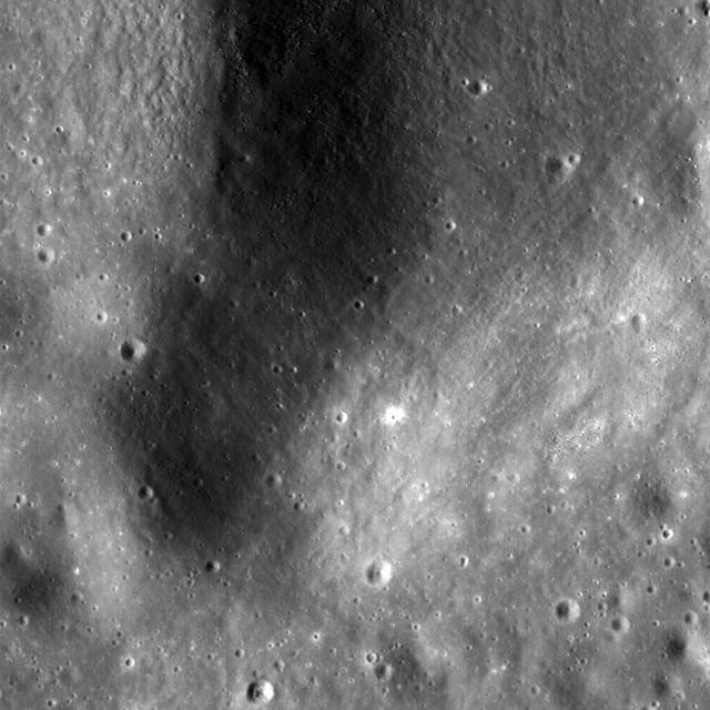 This NASA Lunar Reconnaissance Orbiter LRO image is of the summit crater of Hortensius Dome Phi. Summit craters of all the Hortensius Domes show no raised rims and are not circular, indicating they are analogous to volcanic calderas.