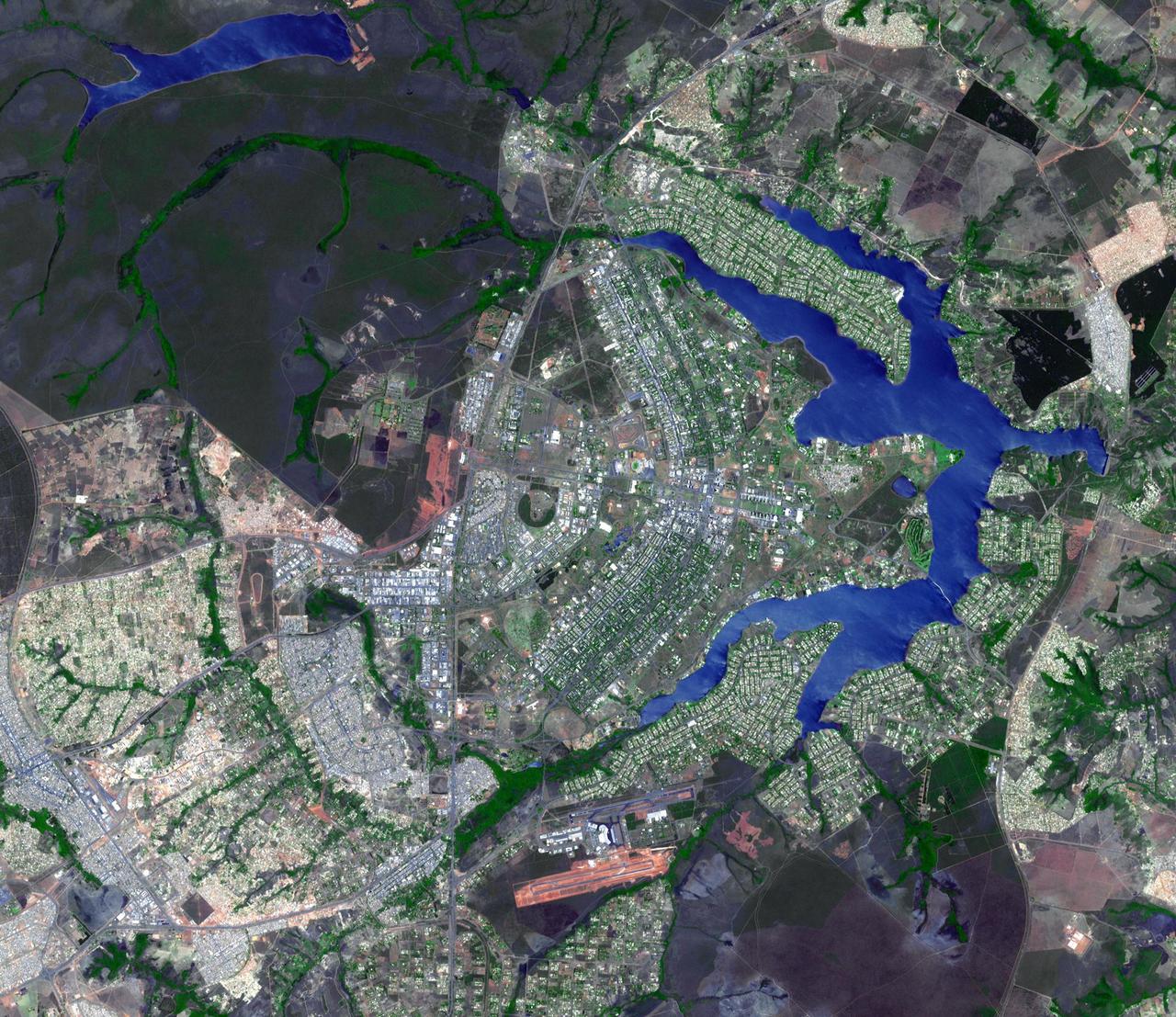 This image from NASA Terra spacecraft shows the planned city of Brasilia, the capital of Brazil, with a population of about 3.6 million for its metropolitan area.