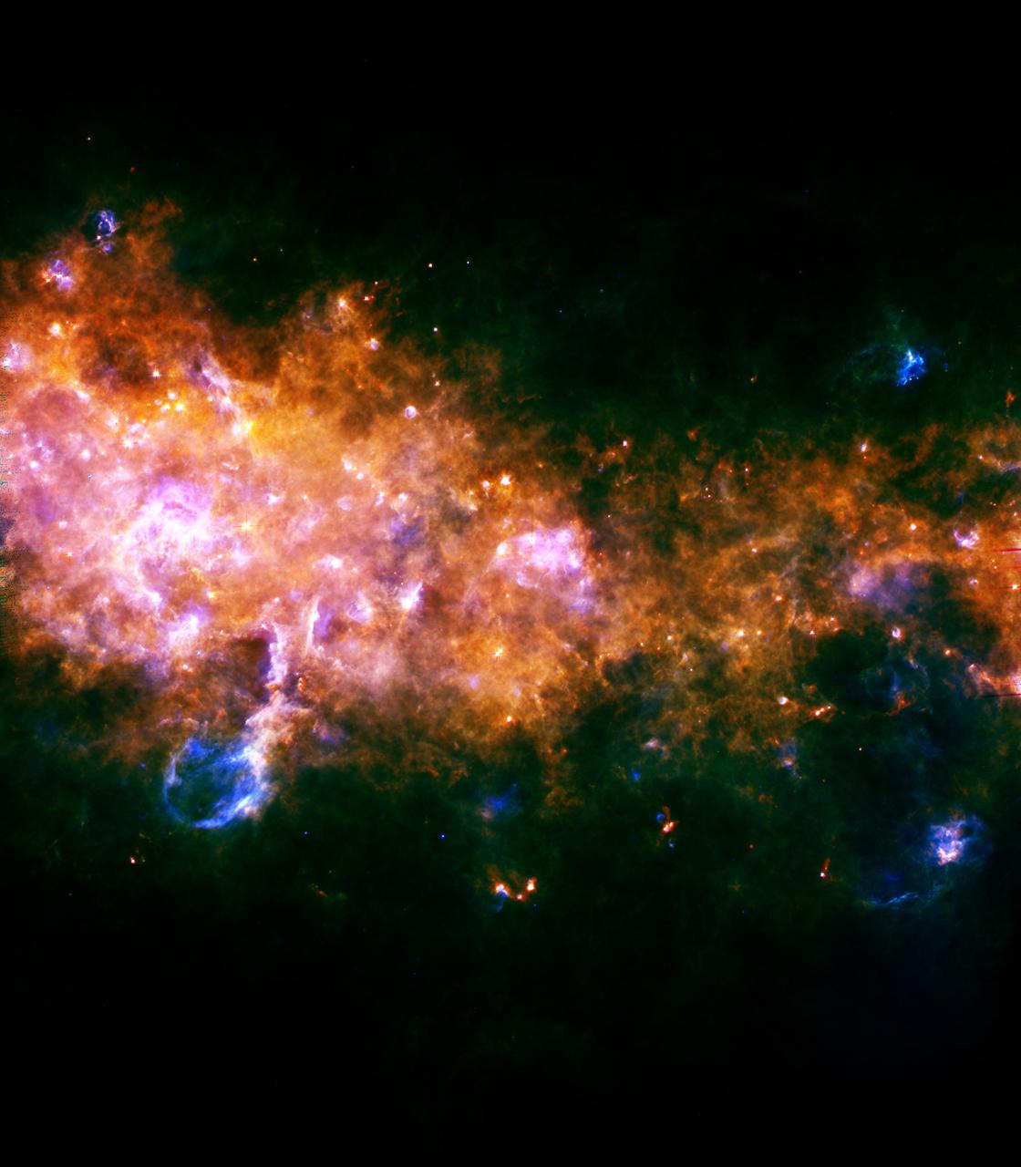 This image from NASA Herschel, was taken looking towards a region of our Milky Way galaxy in the Eagle constellation, closer to the galactic center than our sun. Here, we see the outstanding end products of the stellar assembly line.
