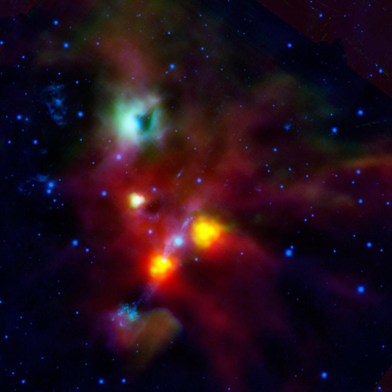 The dark hole seen in the green cloud at the top of this image, captured by ESA Herschel Telescope, was likely carved out by multiple jets and blasts of radiation.