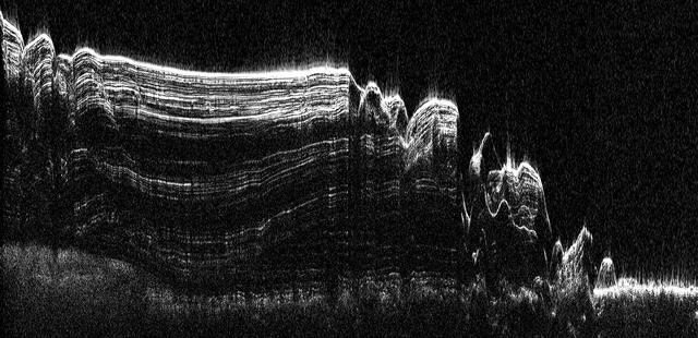 This image shows a cross-section of a portion of the north polar ice cap of Mars, derived from data acquired from NASA Mars Reconnaissance Orbiter Shallow Radar instrument. The data depict the region internal ice structure.