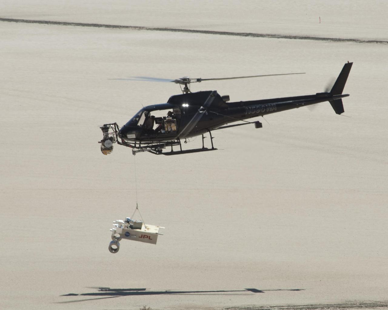 This test for the radar system to be used during the August 2012 descent and landing of NASA Mars rover Curiosity mounted an engineering test model of the radar system onto the nose of a helicopter.
