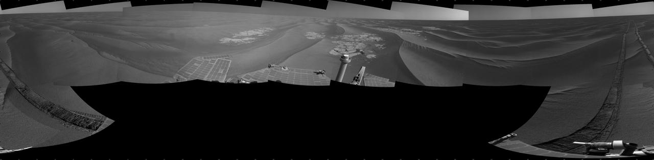 NASA rover Opportunity used its navigation camera to take the images combined into this full 360-degree view of the rover surroundings after a drive on the 2,220th Martian day, or sol, of Opportunity mission on Mars April 22, 2010.