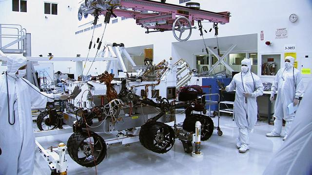 In this picture, the Curiosity rover sports a set of six new wheels. The wheels were installed on June 28 and 29 in the Spacecraft Assembly Facility at NASA Jet Propulsion Laboratory, Pasadena, Calif.