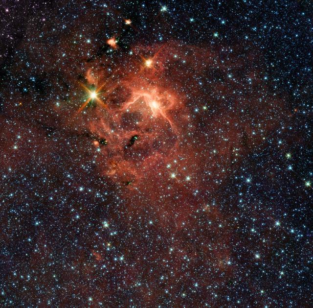 NASA image: Massive Young Star and its Cradle