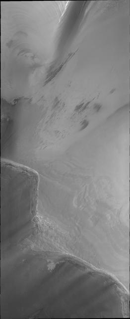 Both polar caps on Mars are composed of many layers of ice and dust. This image from NASA Mars Odyssey clearly shows the layering of the North polar cap.