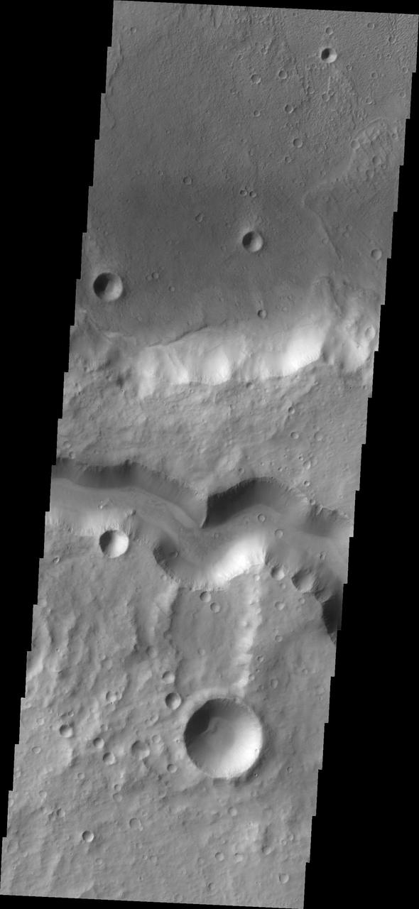 The wide channel in this image captured by NASA Mars Odyssey is Tinto Vallis.