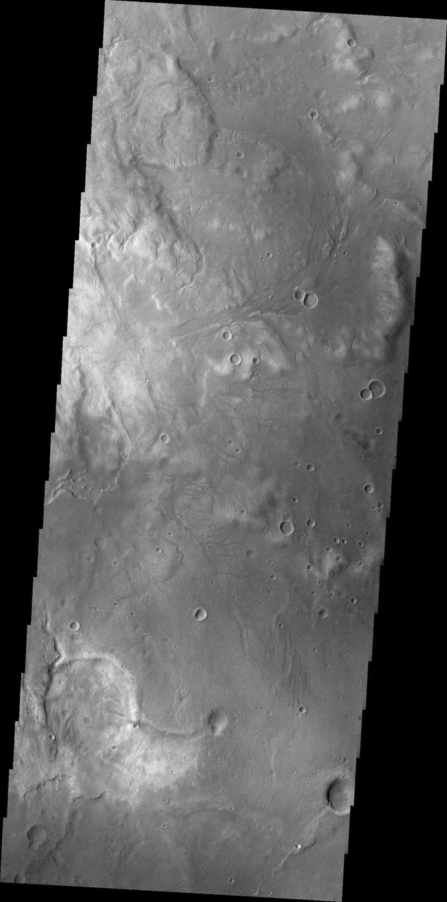 Small unnamed channels drain the surface in this region of Arabia Terra were captured by NASA Mars Odyssey on August 3, 2010.