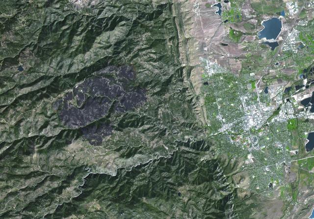 The Advanced Spaceborne Thermal Emission and Reflection Radiometer ASTER instrument aboard NASA Terra spacecraft captured this image of the Fourmile Canyon fire west of Boulder Colo., on Sept. 17, 2010; it was 100 percent contained.