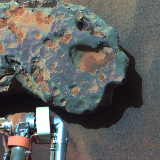 NASA Mars Exploration Rover Opportunity found this image of a meteorite. The science team used two tools on Opportunity arm, the microscopic imager and the alpha particle X-ray spectrometer, to inspect the rock texture and composition.