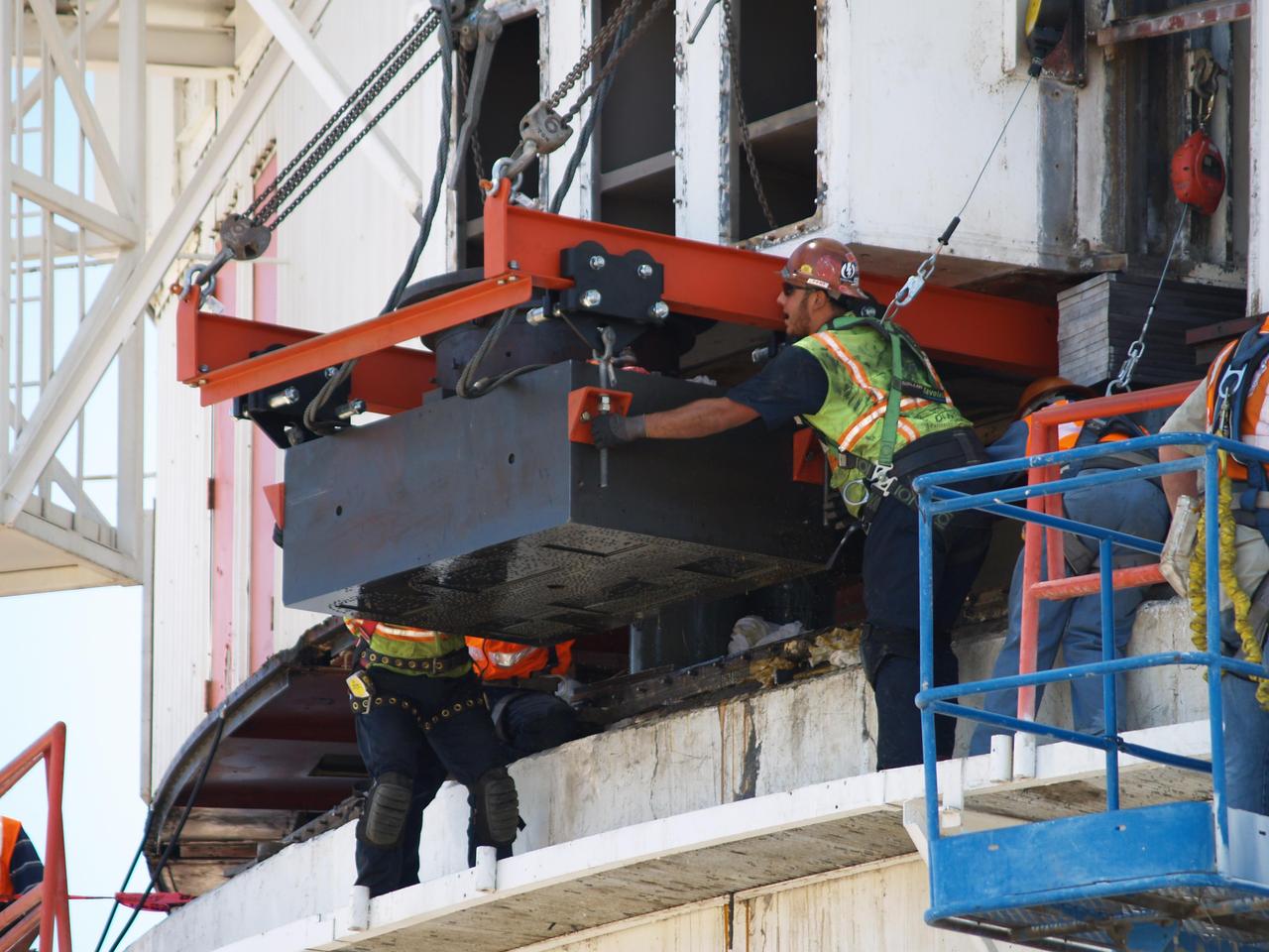 On May 3, 2010, workers at NASA Deep Space Network Goldstone Deep Space Communications Complex removed one of the large steel pads that help the giant Mars antenna rotate sideways.