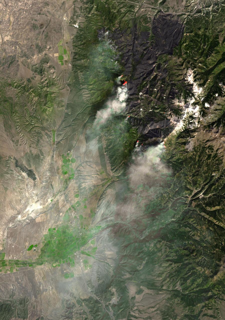 NASA Terra spacecraft captured this image of the Twitchell Canyon fire, a lightning-caused blaze burning in Utah, which has consumed more than 40,000 acres since it began on July 20, 2010.
