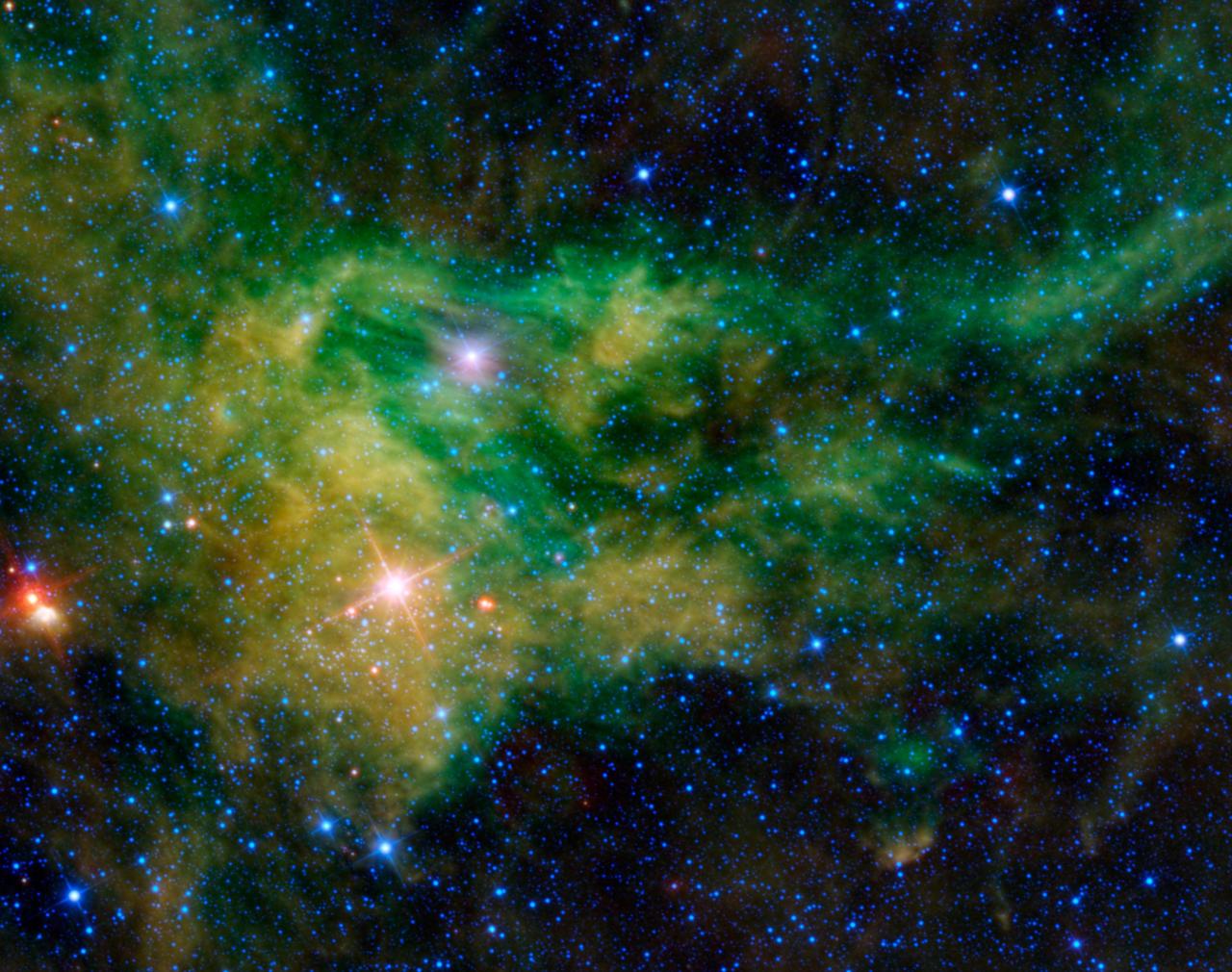 NASA Wide-field Infrared Survey Explorer captured this colorful image of the nebula BFS 29 surrounding the star CE-Camelopardalis, found hovering in the band of the night sky comprising the Milky Way.
