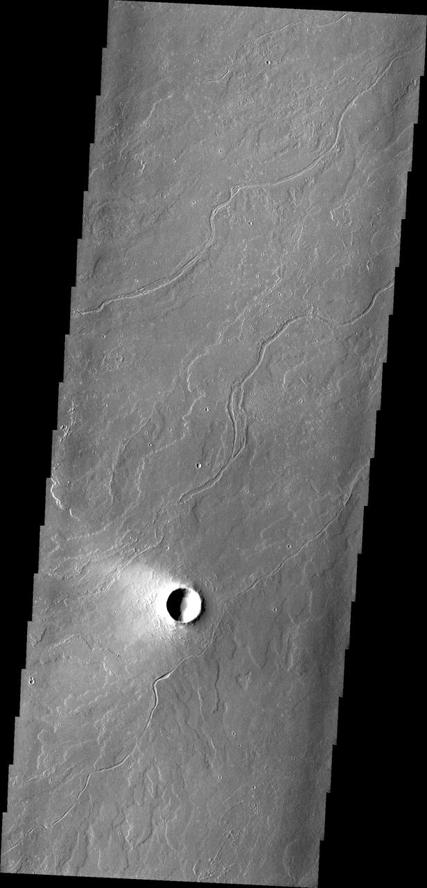 This region of Tharsis near Olympus Mons contains subtle features showing its lava flow origin. Note the oftened flow fronts and lava channels in this image captured by NASA Mars Odyssey spacecraft.