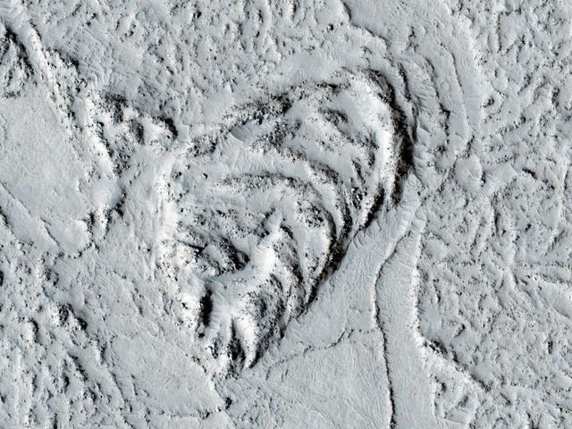 NASA image: Flow Obstructions and Wakes Southeast of Elysium Planitia