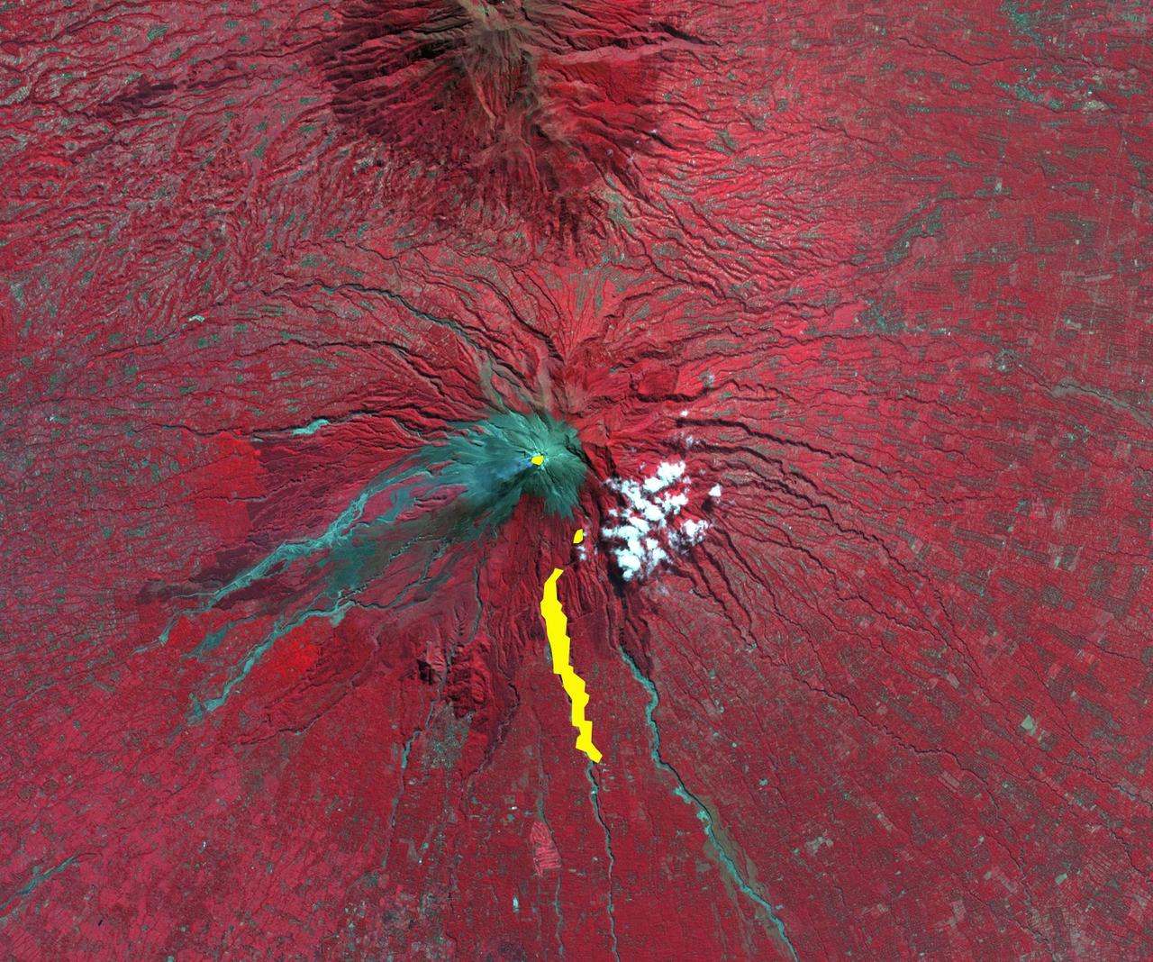 The ASTER instrument onboard NASA Terra spacecraft imaged the hot volcanic flow that resulted from collapse of the summit lava dome from the Merapi volcano in Indonesia that erupted on Oct. 26, 2010.