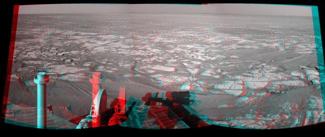 This mosaic of images from NASA Mars Exploration Rover Opportunity shows surroundings of the rover location following an 122.2-meter 401-foot drive on Oct. 25, 2010. 3D glasses are necessary.