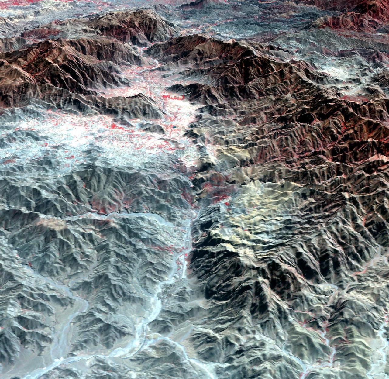 The ASTER instrument onboard NASA Terra spacecraft imaged the Khyber Pass, a mountain pass that links Afghanistan and Pakistan. Throughout its history it has been an important trade route between Central Asia and South Asia.