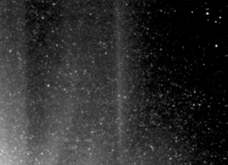 Icy particles in the cloud around Hartley 2, as seen by NASA EPOXI mission spacecraft. A star moving through the background is marked with red and moves in a particular direction, with a particular speed; icy particles move in random directions.