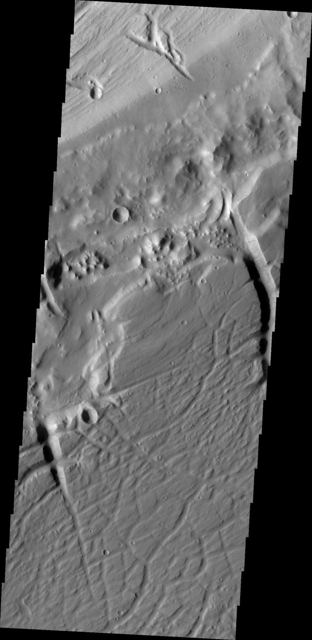This image captured by NASA Mars Odyssey shows a portion of the northern branch of Kasei Valles.