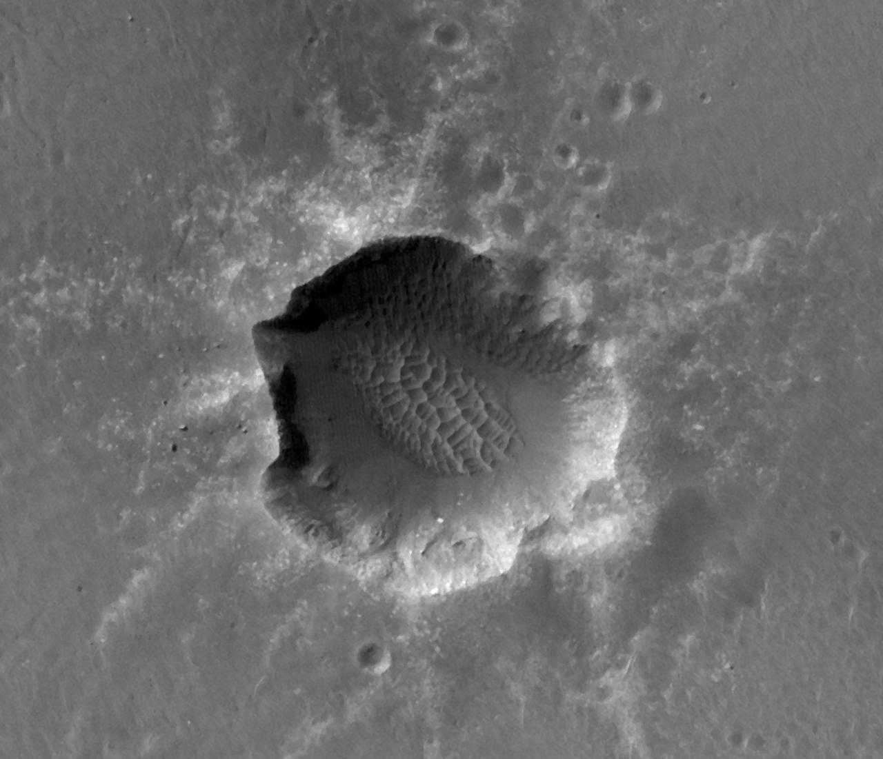 This image of Santa Maria Crater was taken by HiRISE camera on NASA Mars Reconnaissance Orbiter where NASA rover Opportunity approached Santa Maria Crater in December 2010.