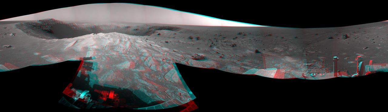 A football-field-size crater, informally named Santa Maria, dominates the scene in this 360-degree stereo view from NASA Mars Exploration Rover Opportunity.