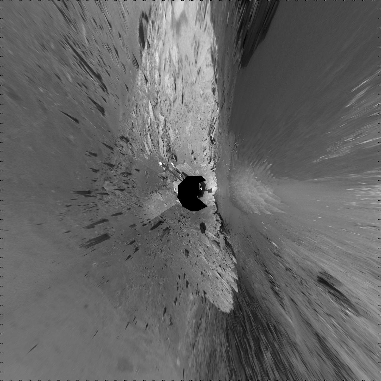 This 360-degree mosaic of images from the navigation camera on NASA Mars Exploration Rover Opportunity shows the view from the western rim of Santa Maria crater is presented as a vertical projection, with north at the top.