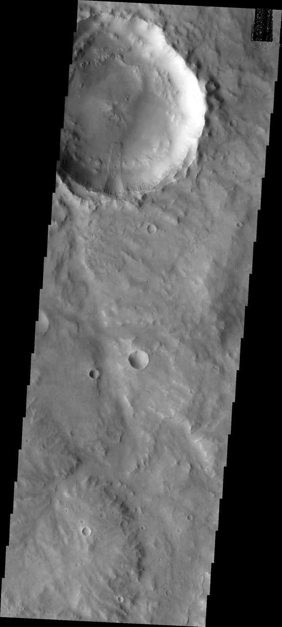 A landslide occurred from the rim of this unnamed crater in Margaritifer Terra as seen by NASA Mars Odyssey.