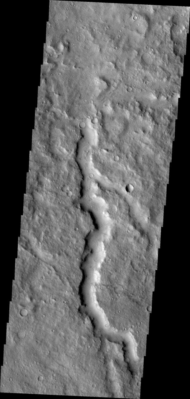 This unnamed channel is located in the northern part of Terra Cimmeria. This image was captured by NASA Mars Odyssey.