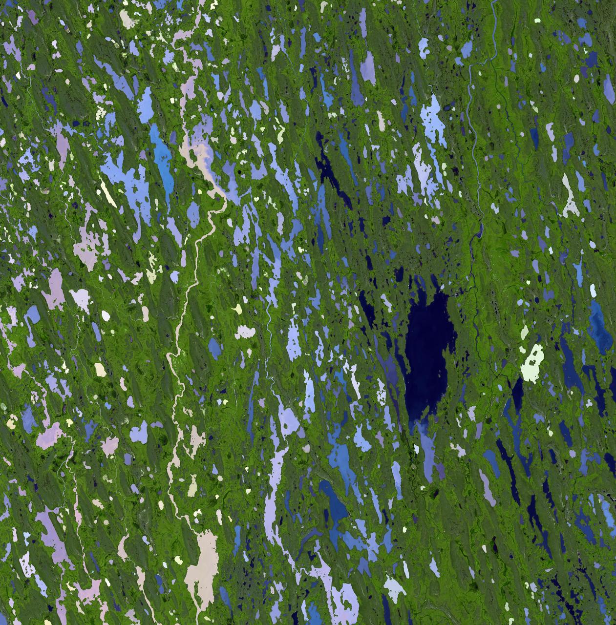 This image from NASA Terra spacecraft shows Nunavut, in northern Canada, the largest and newest federal territory of the country. The name means our land in Inuktitut.