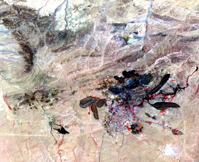 Acquired by NASA Terra spacecraft, this image shows a mine in Baiyun Ebo, Inner Mongolia, China, the site of almost half the world rare earth production. China is responsible for over 95% of global production of rare earth elements.