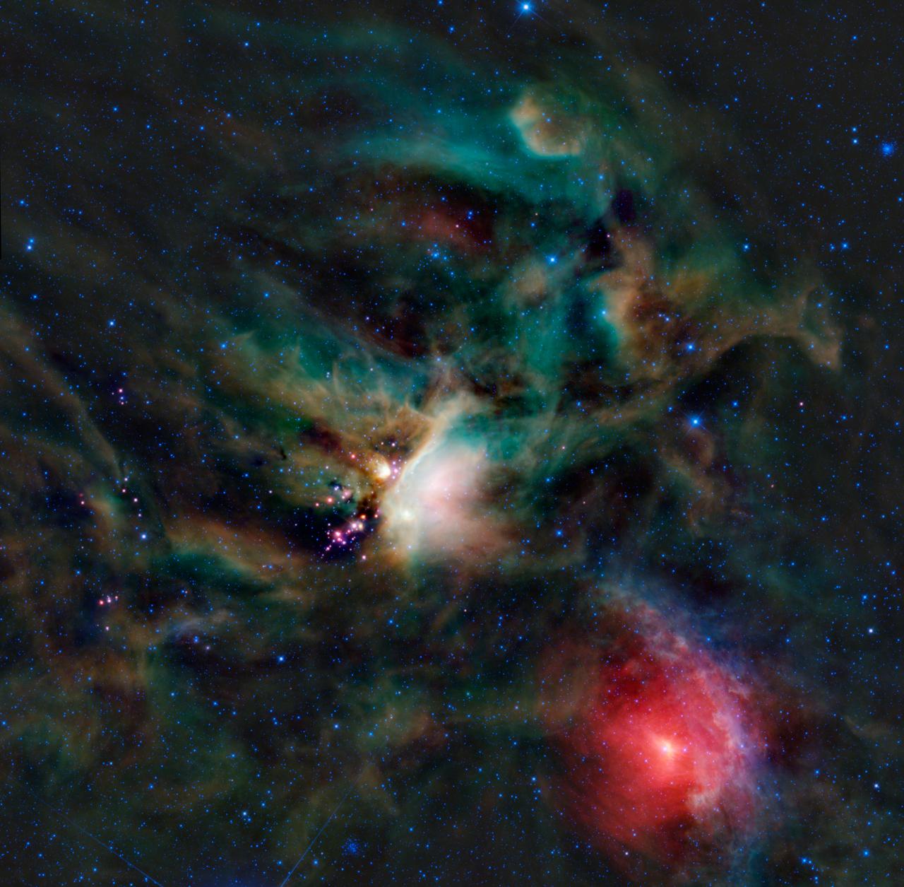 A rich collection of colorful astronomical objects is revealed in this picturesque image of the Rho Ophiuchi cloud complex from NASA Wide-field Infrared Explorer; the cloud is found rising above the plane of the Milky Way in the night sky.