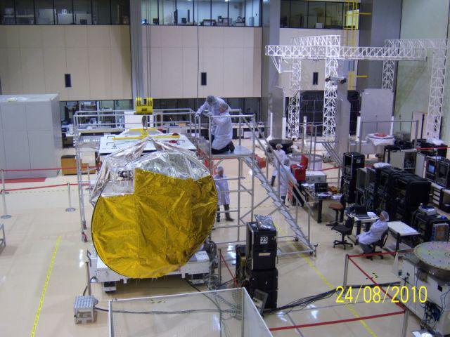 Engineers inspect NASA Aquarius/SAC-D observatory at INVAP facility in Bariloche, Argentina.