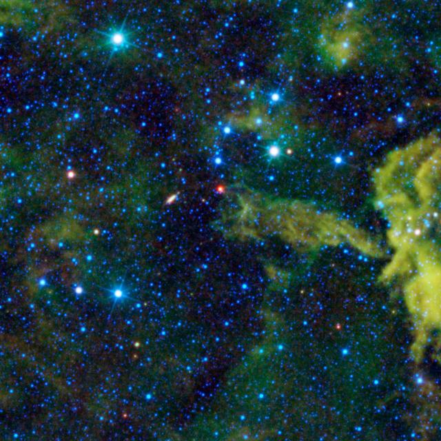 NASA image: Cosmic Alligator Eats its Way through the Sky