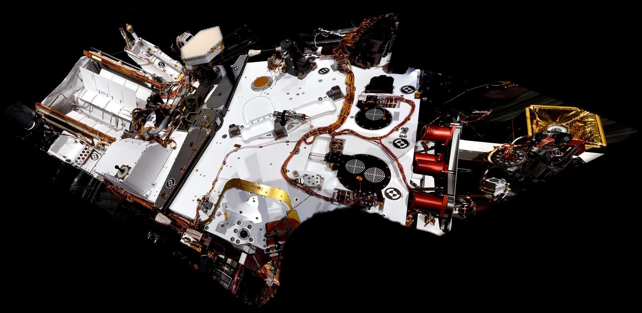 NASA Mars rover Curiosity took the images combined into this mosaic of the rover upper deck. The images were taken in March 2011. At the time, Curiosity was inside a space simulation chamber at NASA Jet Propulsion Laboratory, Pasadena, Calif.