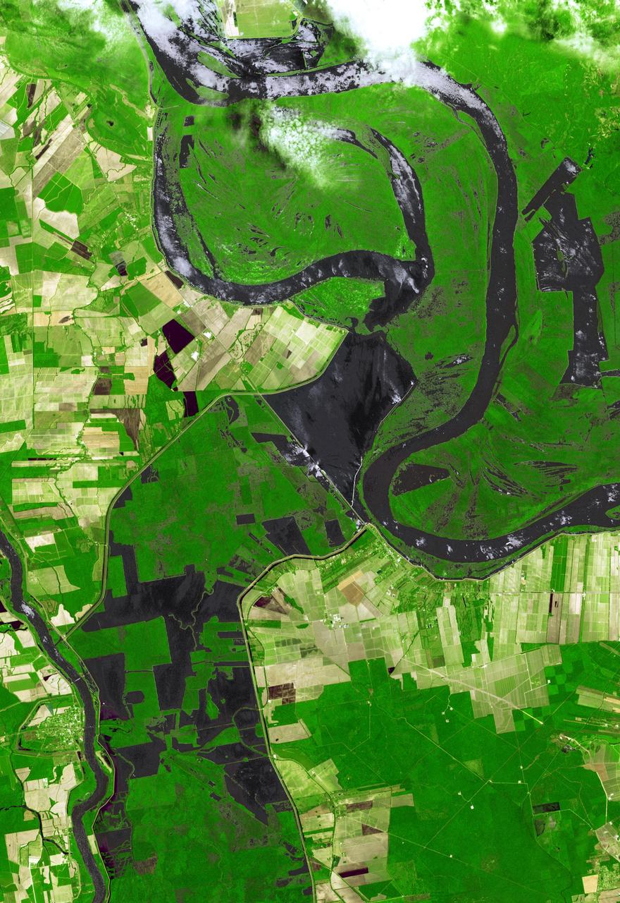 NASA Terra spacecraft shows the water flow after the U.S. Army Corps of Engineers opened the Morganza Spillway, a flood control structure along the western bank of the Mississippi River in Louisiana, to ease flooding along levee systems on May 14, 2011.