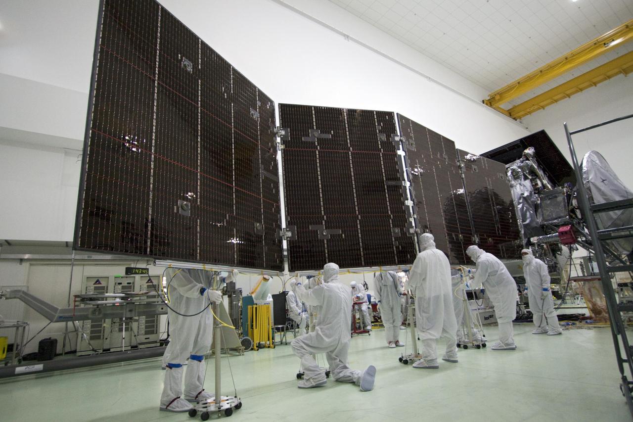 Technicians stow for launch solar array #2 for NASA Juno spacecraft. The photo was taken on May 20, 2011 at the Astrotech payload processing facility in Titusville, Fla.