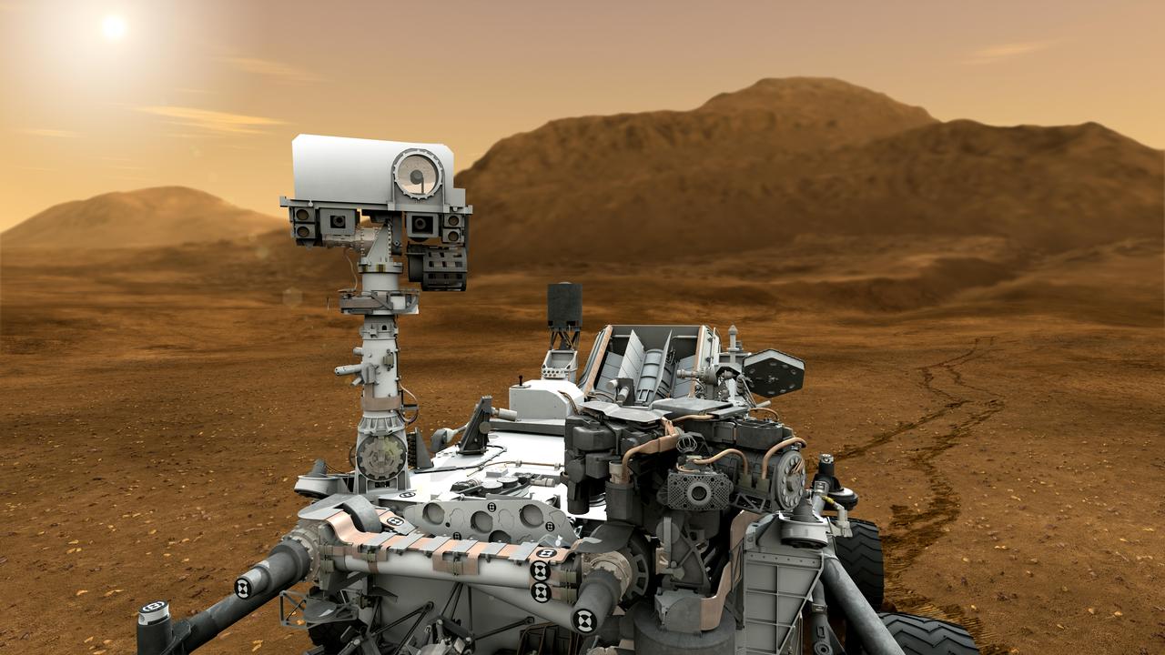This artist concept features NASA Mars Science Laboratory Curiosity rover. The mast, or rover head, rises to about 2.1 meters 6.9 feet above ground level, about as tall as a basketball player.