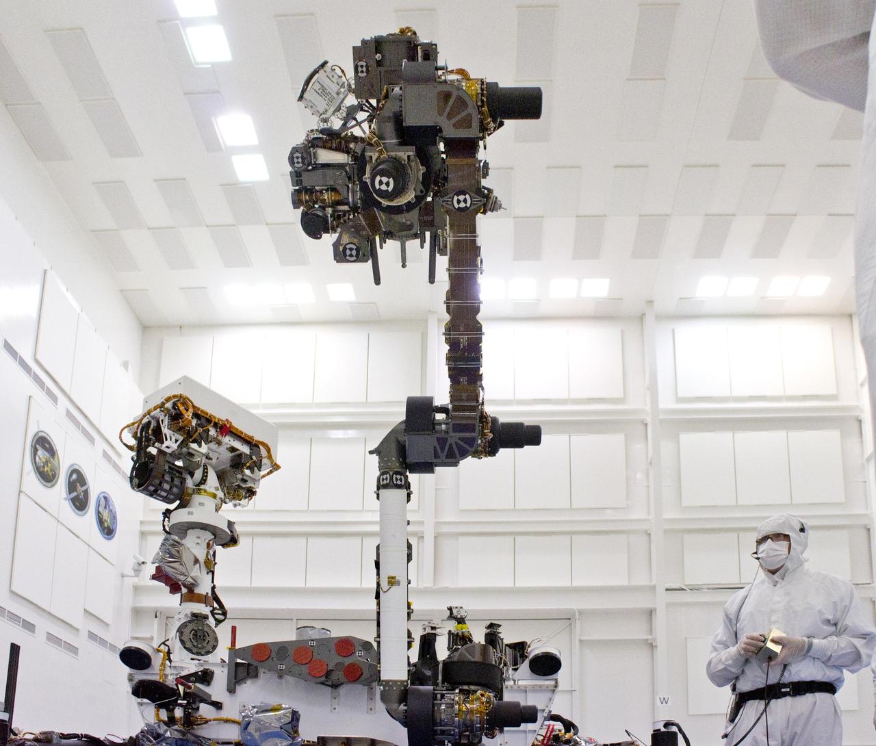 This photograph of the NASA Mars Science Laboratory rover, Curiosity, was taken during testing on June 3, 2011. The turret at the end of Curiosity robotic arm holds five devices. In this view, the drill is at the six oclock position.