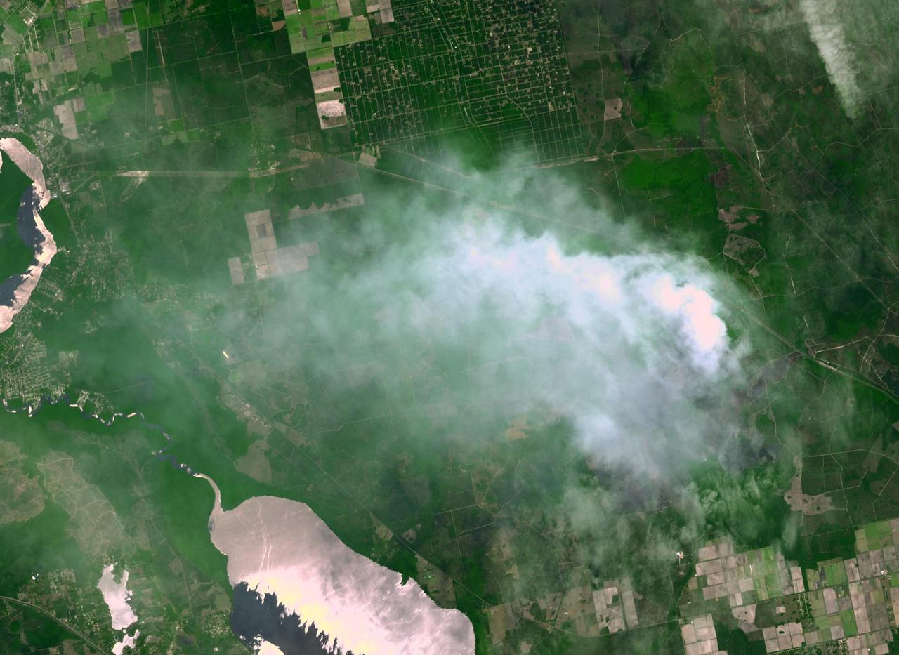 The Espanola wildfire had consumed more than 4,300 acres when the Advanced Spaceborne Thermal Emission and Reflection Radiometer ASTER instrument aboard NASA Terra spacecraft acquired this image on June 16, 2011, over Flagler County, Fla. 