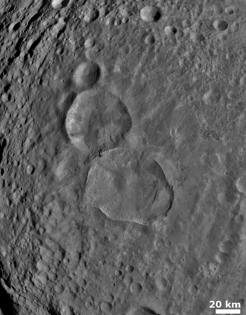 NASA image: Two Large Young Craters